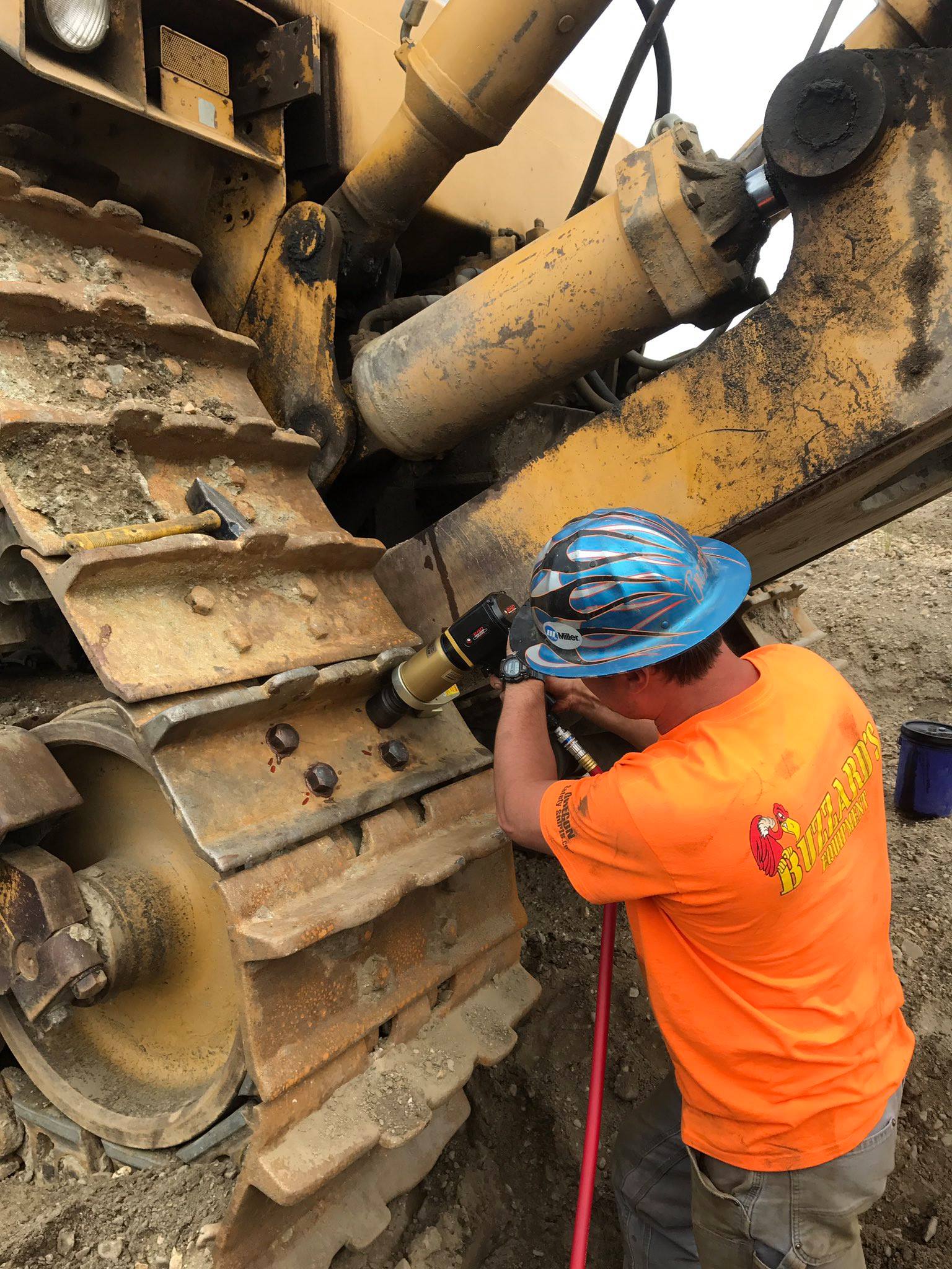 Gold Rush Mitch using a RAD pneumatic torque wrench on mining equipment